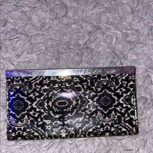 wallet with metal closure